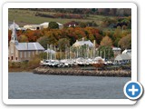 Boatyard and church as we cruise along the Saint Lawrence
