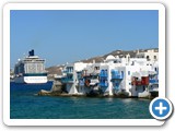 Mykonos and the anchored ship