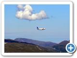 SAS flight coming into Tromso through the valley
