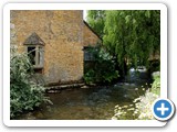 Windrush runs past Bourton cottage