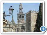 View to the cathedral through the Seville old town