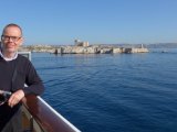 Peter on balcony as we pass the Île d’If