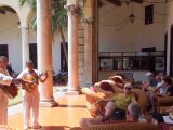 Jetta, Ian and Denise being serenaded on hotel terrace