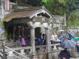 Otowa waterfall, where three channels of water fall into a pond